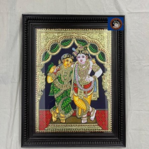 Radha Krishna Tanjore painting with Radha holding a parrot, black beaded wooden frame